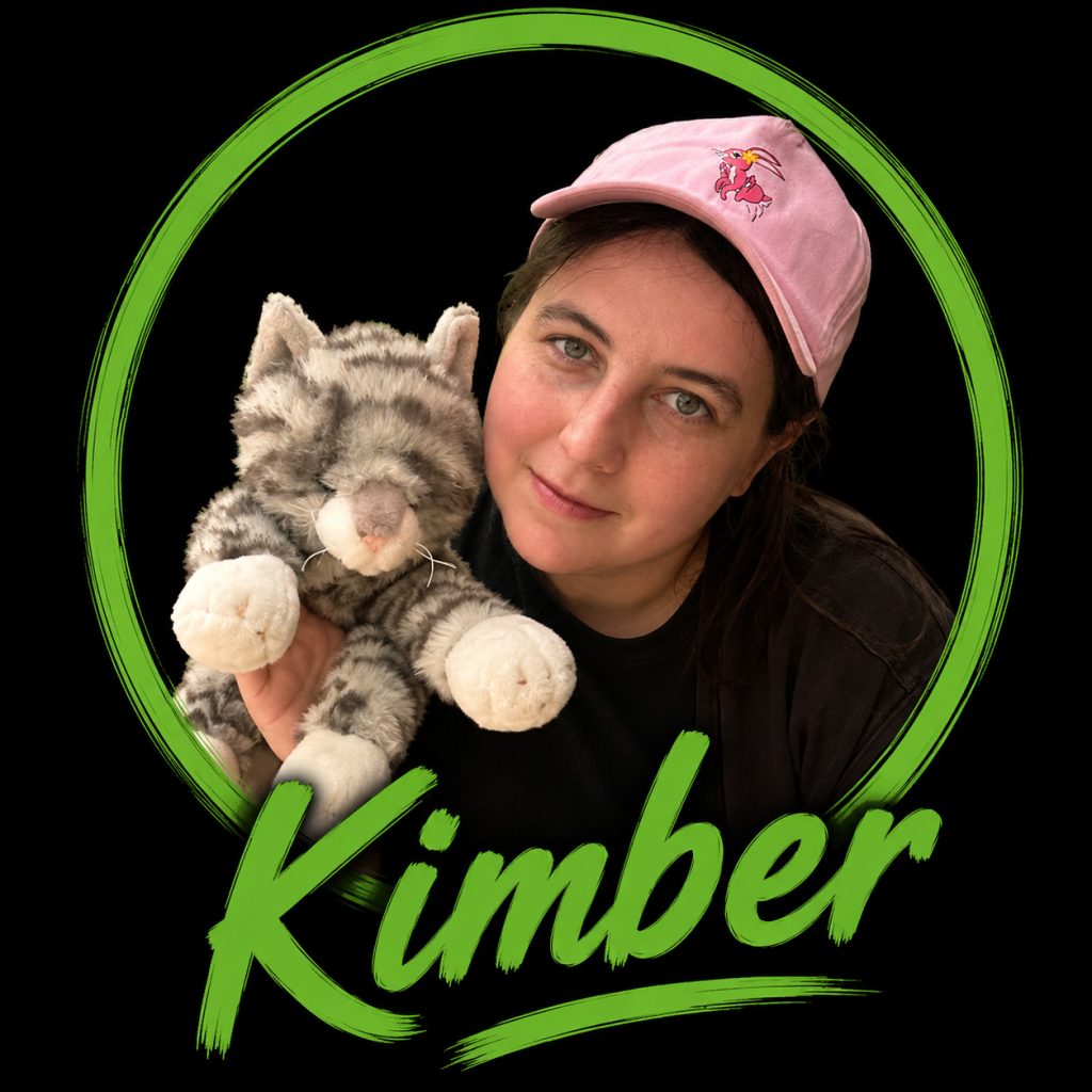 Kimber, puppeteer with Tiger the Cat puppet from the Pink Patsy puppet show, bringing children's stories to life through fun character voices and puppetry.