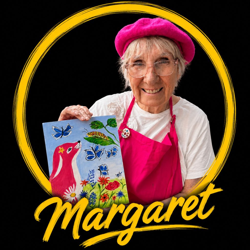Margaret, illustrator and co-creator of Pink Patsy, holding her original Pink Patsy artwork for Magmay Books children's books.