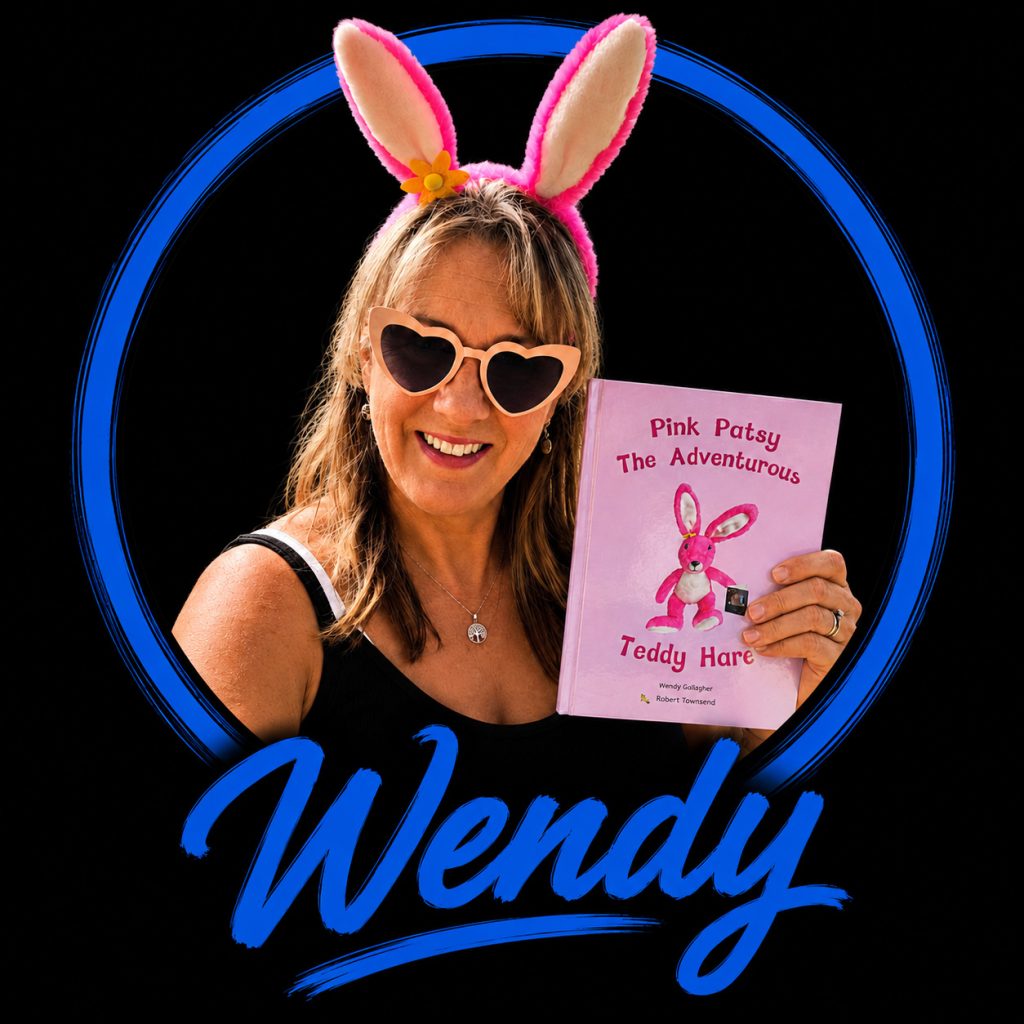 Wendy Gallagher, author, publisher and creator of Pink Patsy, holding her children's book Pink Patsy: Teddy Hare.