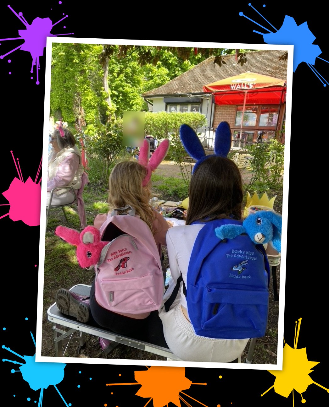 Two children with Pink Patsy and Bobby Blue Adventure Pack rucksacks at an outdoor craft table