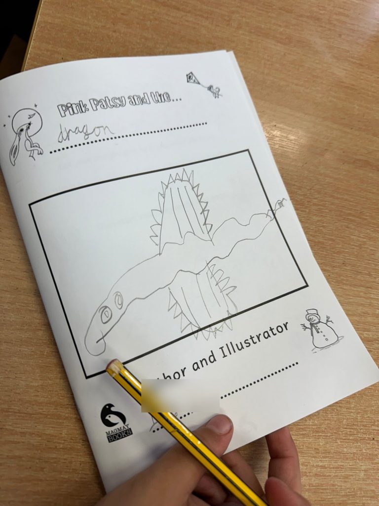A child’s story booklet cover, Pink Patsy and the Dragon, with a pencil drawing of a spiky dragon
