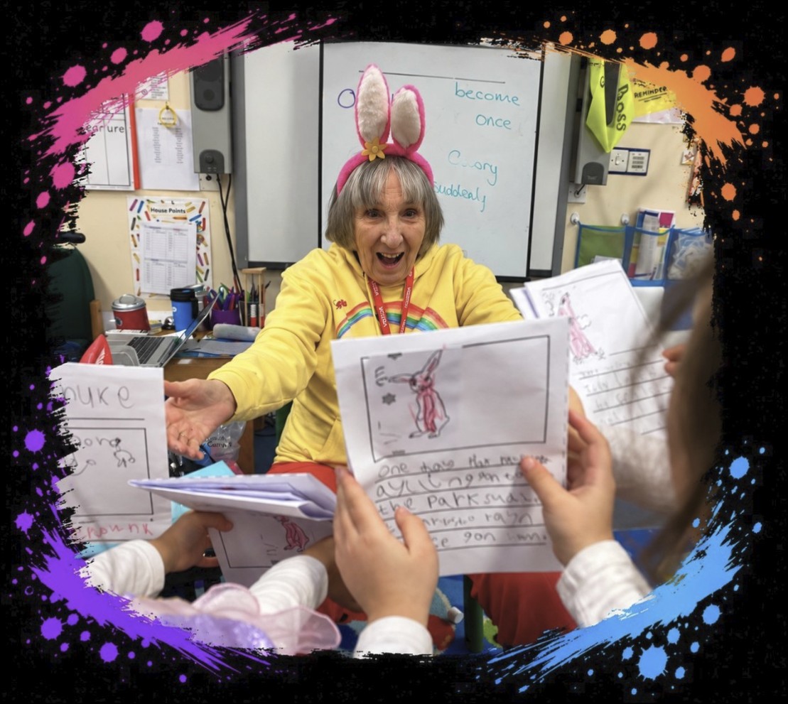 Author in Pink Patsy bunny ears welcoming children’s stories during a Magmay Books school visit