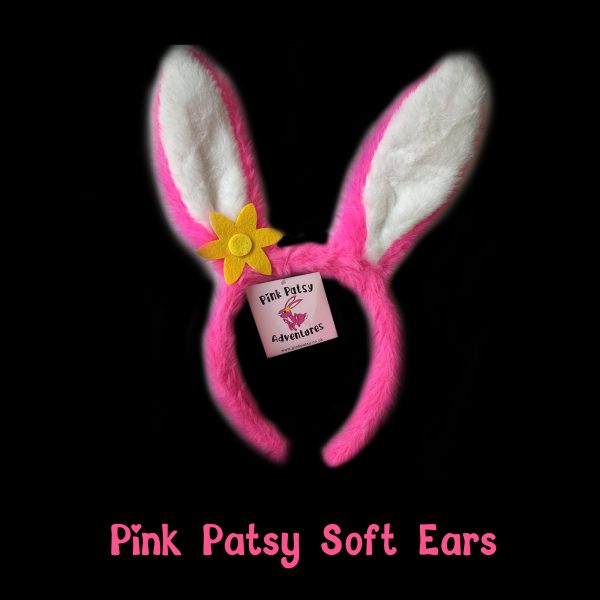 Pink Patsy Soft Ears Pink Patsy Soft Ears: fluffy pink and white hare ears headband with a yellow flower and Pink Patsy Adventures tag