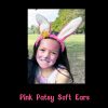 Pink Patsy Soft Ears worn with bunny face paint Smiling child wearing Pink Patsy Soft Ears with pink bunny face paint in the park
