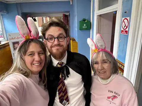 Wendy and Margaret in pink bunny ears with a teacher dressed as Harry Potter